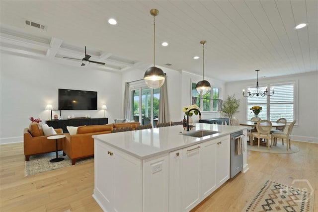 15 Reed Grass Ln, Savannah, GA 31405 - kitchen featuring dishwasher, a sink, light wood-style flooring, white cabinetry, and recessed lighting