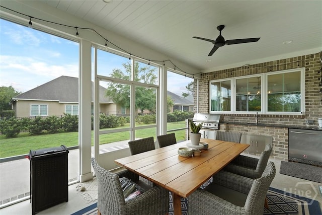 15 Reed Grass Ln, Savannah, GA 31405 - sunroom / solarium featuring exterior kitchen, ceiling fan, outdoor dining area, and a sink