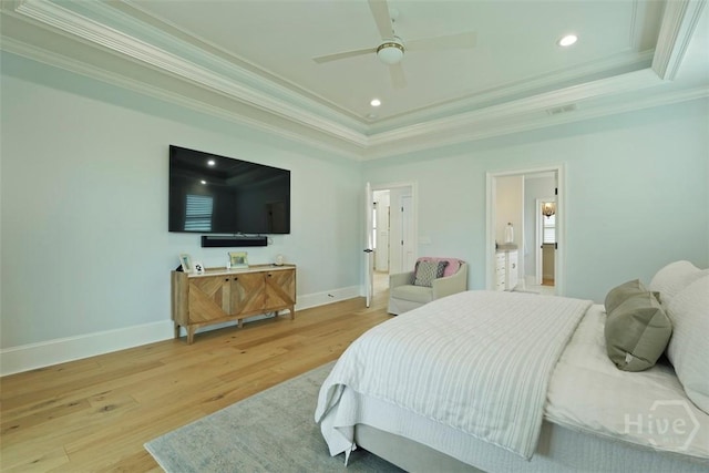 15 Reed Grass Ln, Savannah, GA 31405 - bedroom with ornamental molding, a tray ceiling, light wood-type flooring, recessed lighting, and baseboards
