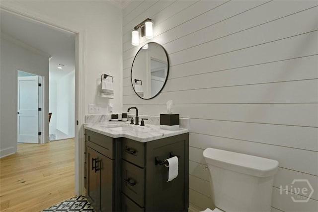 15 Reed Grass Ln, Savannah, GA 31405 - half bath with toilet, ornamental molding, vanity, and wood finished floors