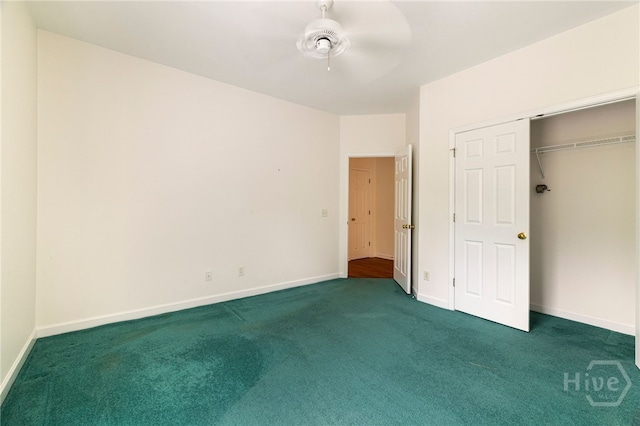 35 Wild Thistle Ln, Savannah, GA 31406 - unfurnished bedroom featuring dark carpet, baseboards, a ceiling fan, and a closet
