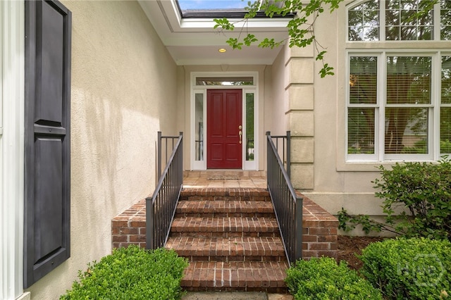 35 Wild Thistle Ln, Savannah, GA 31406 - doorway to property with stucco siding