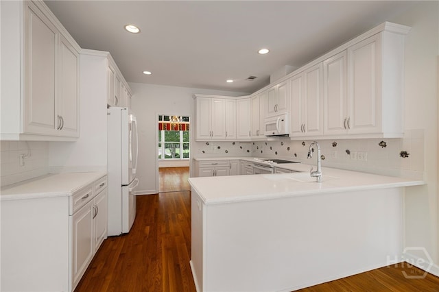 35 Wild Thistle Ln, Savannah, GA 31406 - laundry area with a sink, dark wood-style floors, and recessed lighting