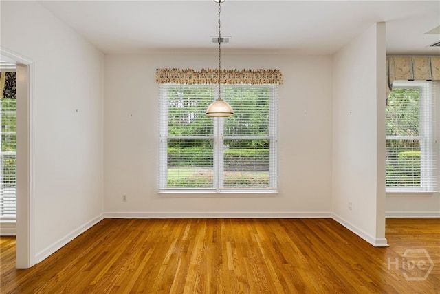 35 Wild Thistle Ln, Savannah, GA 31406 - unfurnished dining area with wood finished floors and baseboards