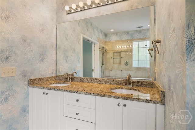 35 Wild Thistle Ln, Savannah, GA 31406 - full bathroom featuring wallpapered walls, a tile shower, and double vanity
