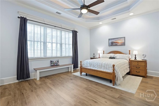 711 Chastain Cir, Richmond Hill, GA 31324 - bedroom featuring ornamental molding, a raised ceiling, wood finished floors, baseboards, and recessed lighting