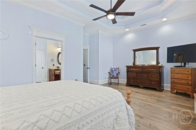 711 Chastain Cir, Richmond Hill, GA 31324 - bedroom featuring crown molding, wood finished floors, recessed lighting, a raised ceiling, and baseboards