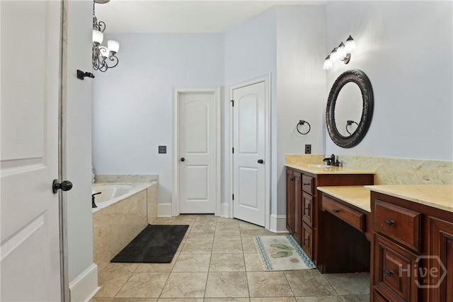 711 Chastain Cir, Richmond Hill, GA 31324 - bathroom with a garden tub, vanity, and tile patterned floors