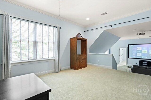 711 Chastain Cir, Richmond Hill, GA 31324 - unfurnished bedroom featuring carpet floors, crown molding, baseboards, and multiple windows