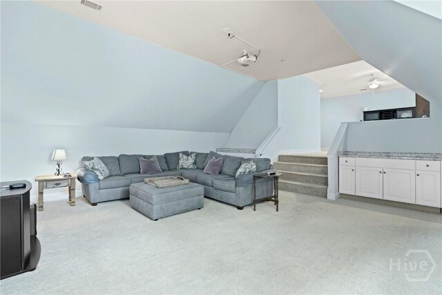 711 Chastain Cir, Richmond Hill, GA 31324 - living area with light carpet and stairway
