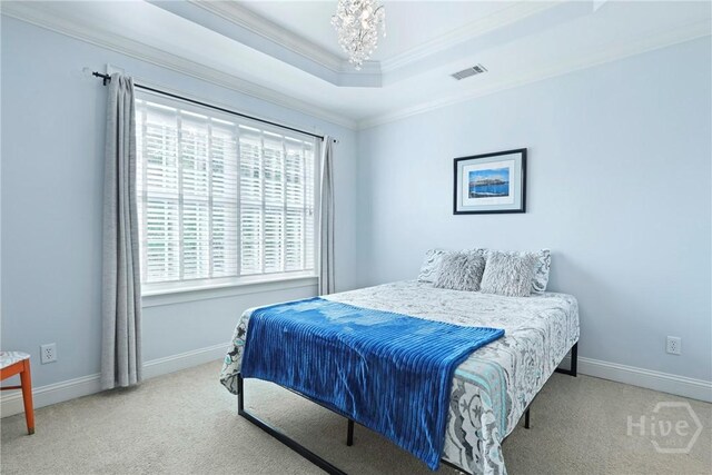 711 Chastain Cir, Richmond Hill, GA 31324 - bedroom featuring carpet, crown molding, a raised ceiling, baseboards, and a chandelier