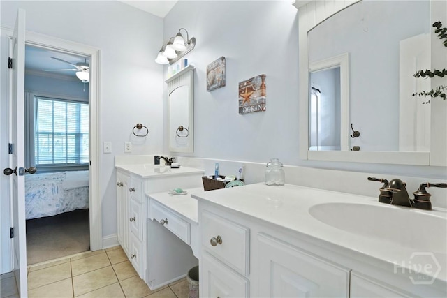 711 Chastain Cir, Richmond Hill, GA 31324 - full bathroom featuring double vanity, a ceiling fan, ensuite bathroom, and tile patterned floors