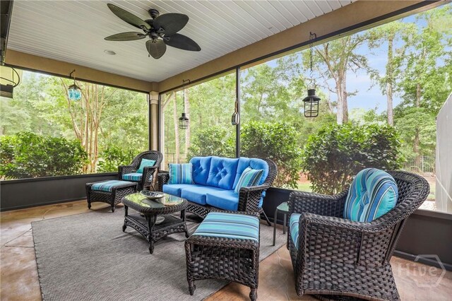 711 Chastain Cir, Richmond Hill, GA 31324 - sunroom / solarium featuring an outdoor hangout area and ceiling fan