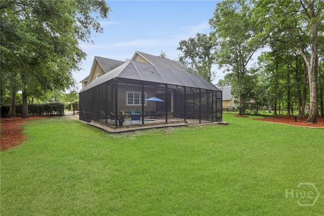 711 Chastain Cir, Richmond Hill, GA 31324 - rear view of house featuring a lawn, a pool, a lanai, and a patio
