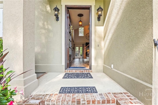 711 Chastain Cir, Richmond Hill, GA 31324 - property entrance with french doors and stucco siding