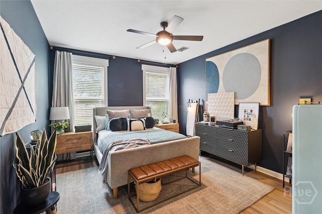 131 Tanzania Trl, Pooler, GA 31322 - bedroom with wood finished floors, a ceiling fan, and baseboards