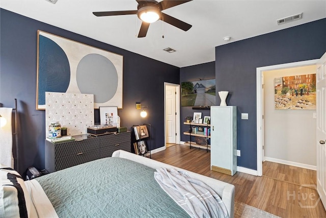 131 Tanzania Trl, Pooler, GA 31322 - bedroom featuring wood finished floors, baseboards, and ceiling fan