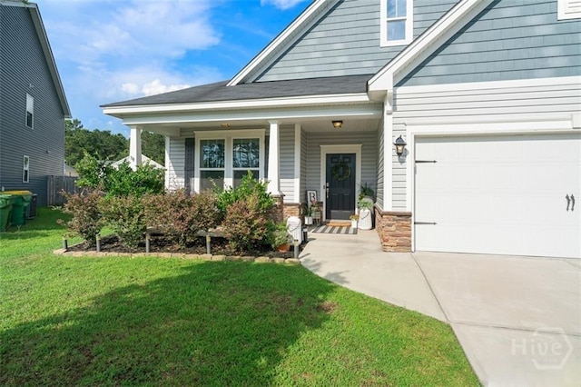 131 Tanzania Trl, Pooler, GA 31322 - view of front of home featuring concrete driveway, a front yard, and covered porch