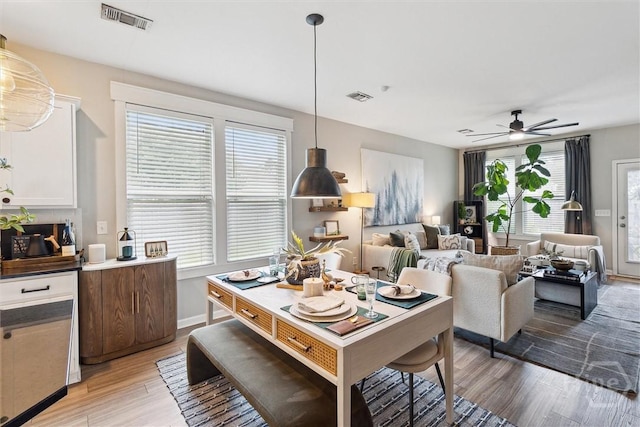131 Tanzania Trl, Pooler, GA 31322 - dining space with light wood-style floors, ceiling fan, and baseboards