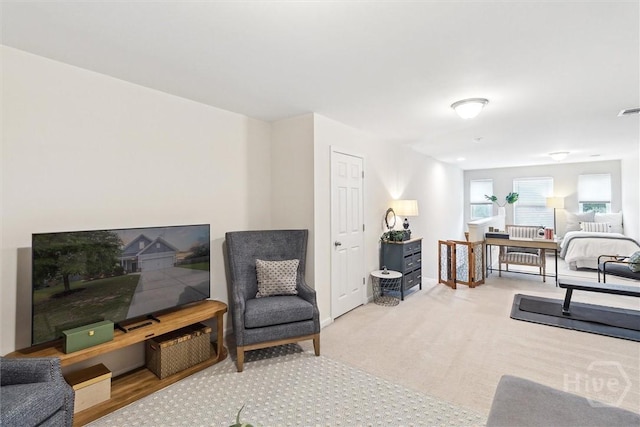 131 Tanzania Trl, Pooler, GA 31322 - carpeted living room featuring baseboards