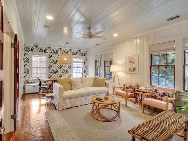 16 12th St, Tybee Island, GA 31328 - living area with wood finished floors, ceiling fan, and wood ceiling