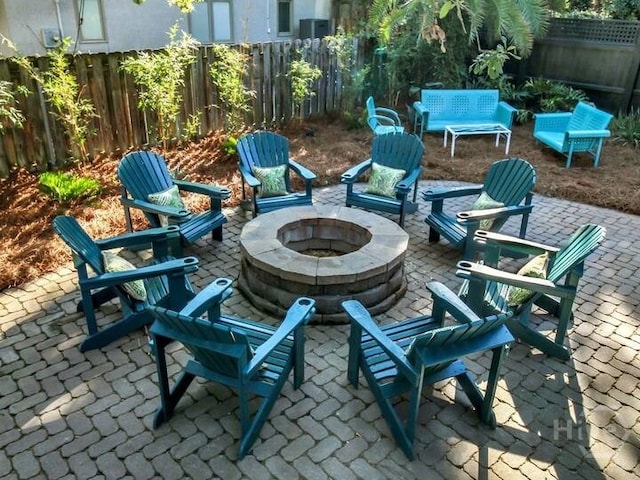 16 12th St, Tybee Island, GA 31328 - view of patio featuring an outdoor fire pit