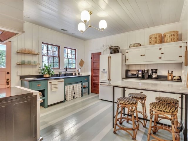 16 12th St, Tybee Island, GA 31328 - kitchen featuring white appliances, white cabinetry, wood ceiling, a sink, and open shelves