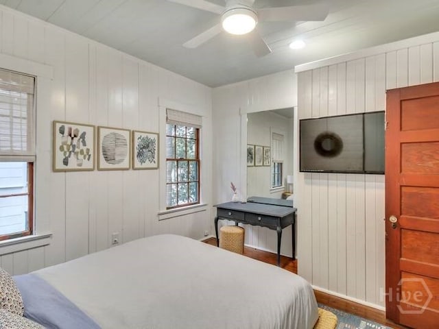 16 12th St, Tybee Island, GA 31328 - bedroom with wood finished floors and a ceiling fan