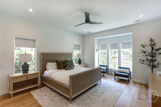 217 John Wesley Way, Savannah, GA 31404 - bedroom featuring light wood-type flooring, multiple windows, baseboards, recessed lighting, and ceiling fan