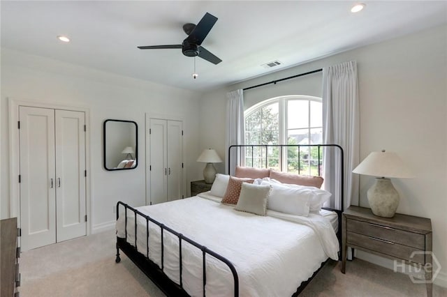 217 John Wesley Way, Savannah, GA 31404 - bedroom featuring multiple closets, light carpet, recessed lighting, a ceiling fan, and baseboards