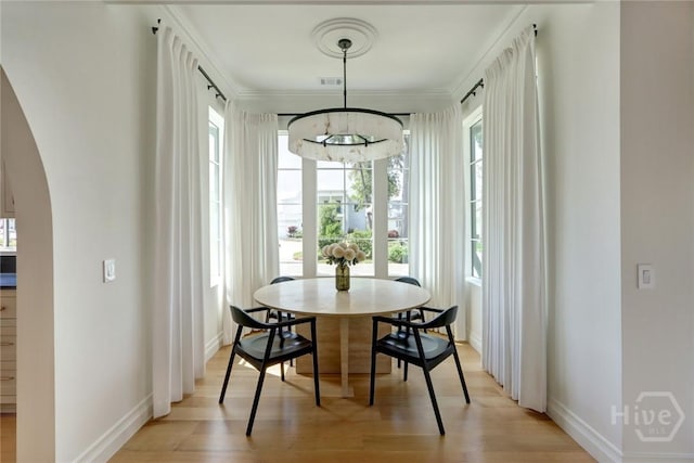 217 John Wesley Way, Savannah, GA 31404 - dining space featuring arched walkways, plenty of natural light, and baseboards