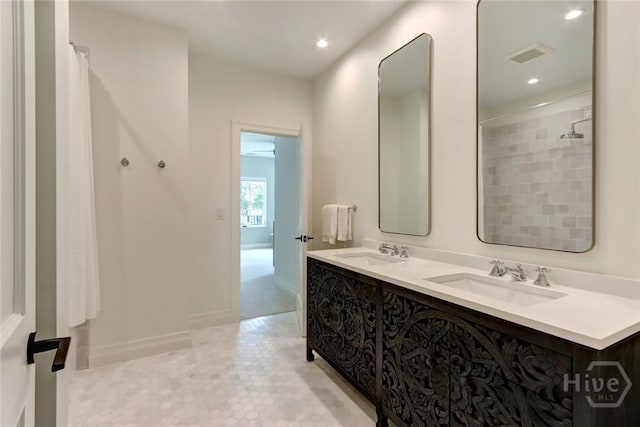 217 John Wesley Way, Savannah, GA 31404 - bathroom with double vanity, a shower with curtain, and recessed lighting