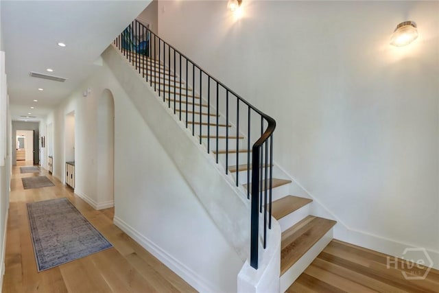 217 John Wesley Way, Savannah, GA 31404 - staircase featuring baseboards, wood finished floors, and recessed lighting