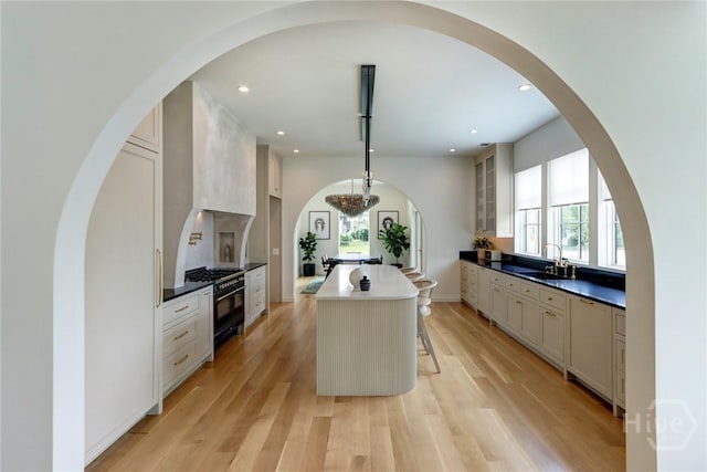 217 John Wesley Way, Savannah, GA 31404 - kitchen with double oven range, plenty of natural light, a sink, recessed lighting, and a kitchen island