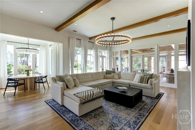 217 John Wesley Way, Savannah, GA 31404 - living area featuring a chandelier, beam ceiling, and wood finished floors