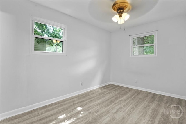 2030 E 42nd St, Savannah, GA 31404 - unfurnished room with wood finished floors, baseboards, and ceiling fan