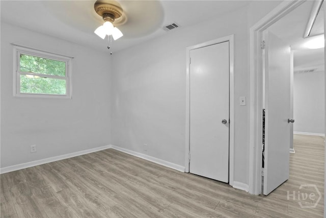 2030 E 42nd St, Savannah, GA 31404 - empty room with a ceiling fan, light wood-type flooring, and baseboards