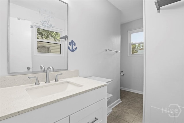 2030 E 42nd St, Savannah, GA 31404 - bathroom with vanity, plenty of natural light, tile patterned floors, and baseboards