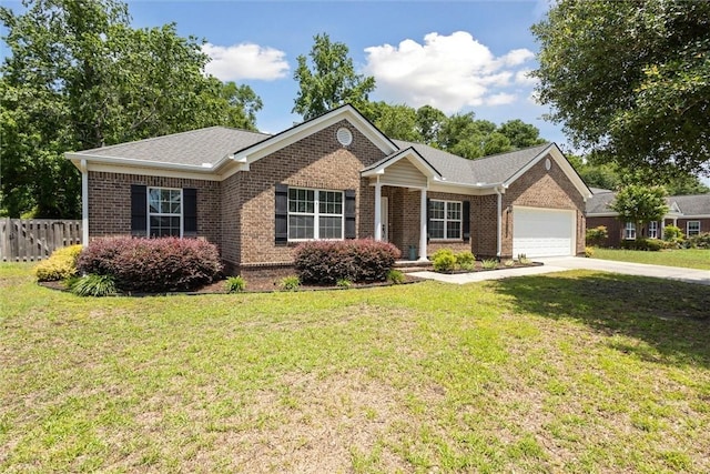 133 Cobbleton Dr, Rincon, GA 31326 - ranch-style house with brick siding, an attached garage, and driveway