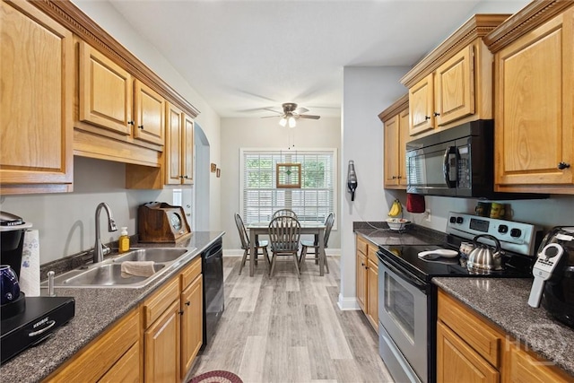 133 Cobbleton Dr, Rincon, GA 31326 - kitchen featuring black appliances, a sink, light wood finished floors, a ceiling fan, and baseboards