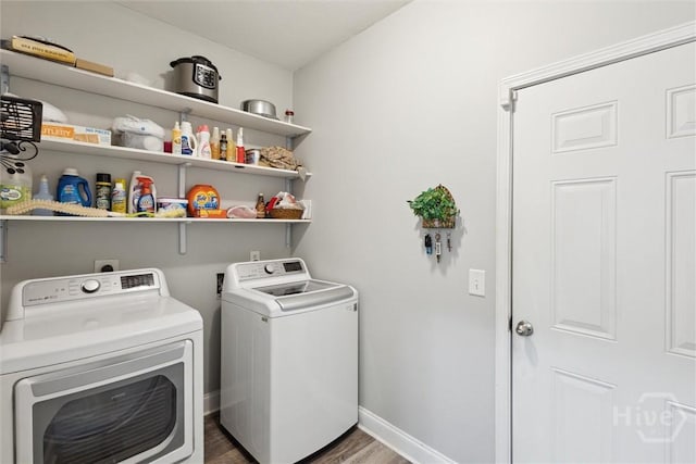 133 Cobbleton Dr, Rincon, GA 31326 - laundry room with washing machine and clothes dryer, wood finished floors, and baseboards