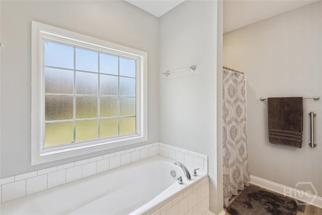 133 Cobbleton Dr, Rincon, GA 31326 - bathroom featuring a garden tub, baseboards, and a shower with curtain