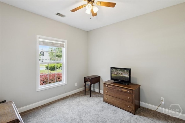 133 Cobbleton Dr, Rincon, GA 31326 - living area featuring light carpet, baseboards, and ceiling fan