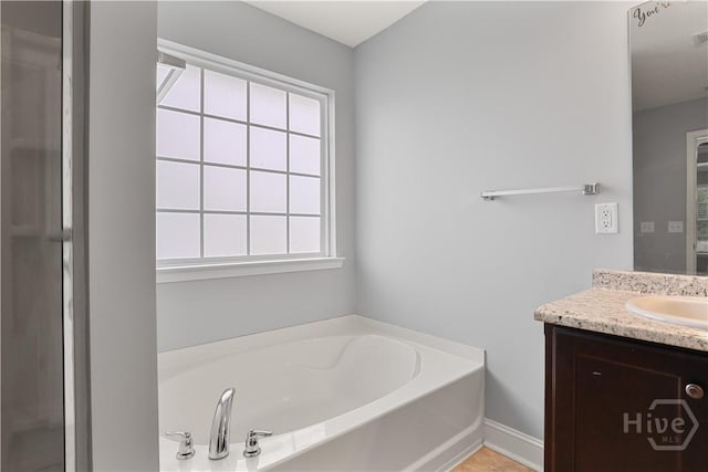 42 Kinlock Ct, Midway, GA 31320 - bathroom featuring vanity and a bath