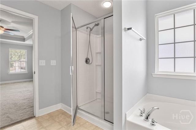 42 Kinlock Ct, Midway, GA 31320 - bathroom with a shower stall, a garden tub, a ceiling fan, baseboards, and crown molding
