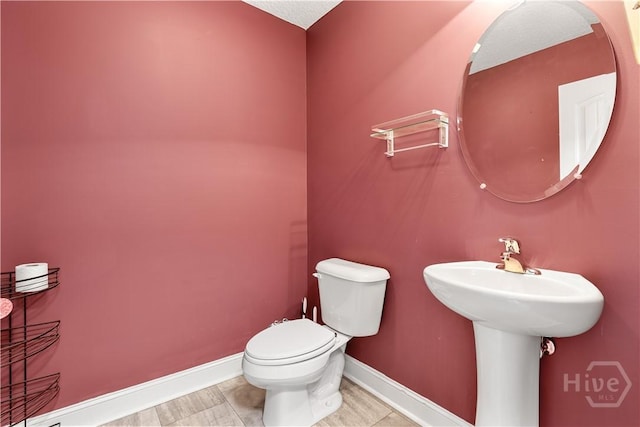 42 Kinlock Ct, Midway, GA 31320 - half bathroom with toilet and baseboards