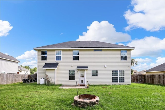 42 Kinlock Ct, Midway, GA 31320 - rear view of house featuring an outdoor fire pit and a patio