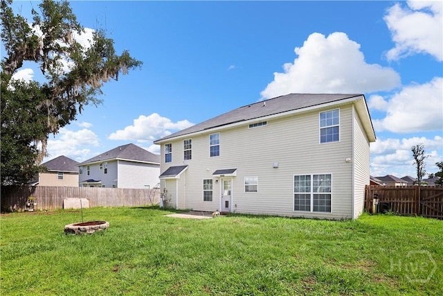 42 Kinlock Ct, Midway, GA 31320 - back of house featuring a fire pit
