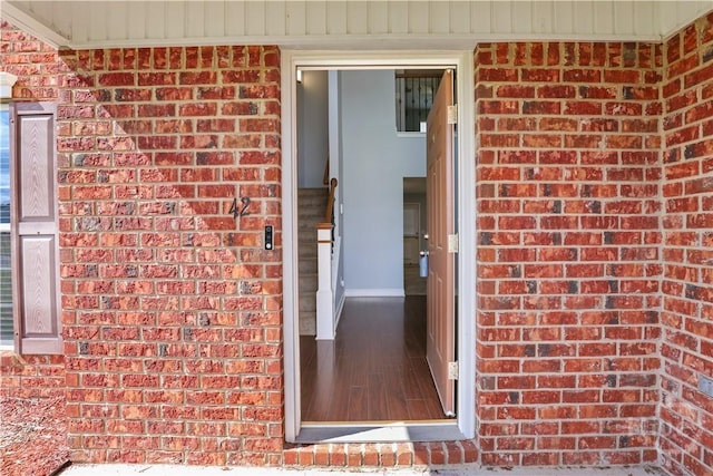 42 Kinlock Ct, Midway, GA 31320 - doorway to property with brick siding