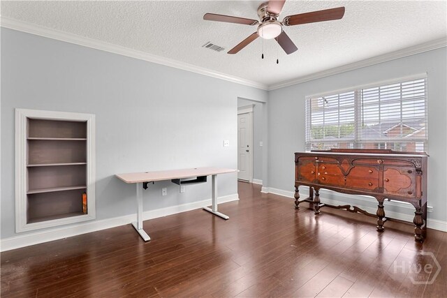42 Kinlock Ct, Midway, GA 31320 - home office with ceiling fan, a textured ceiling, hardwood / wood-style flooring, built in shelves, and baseboards